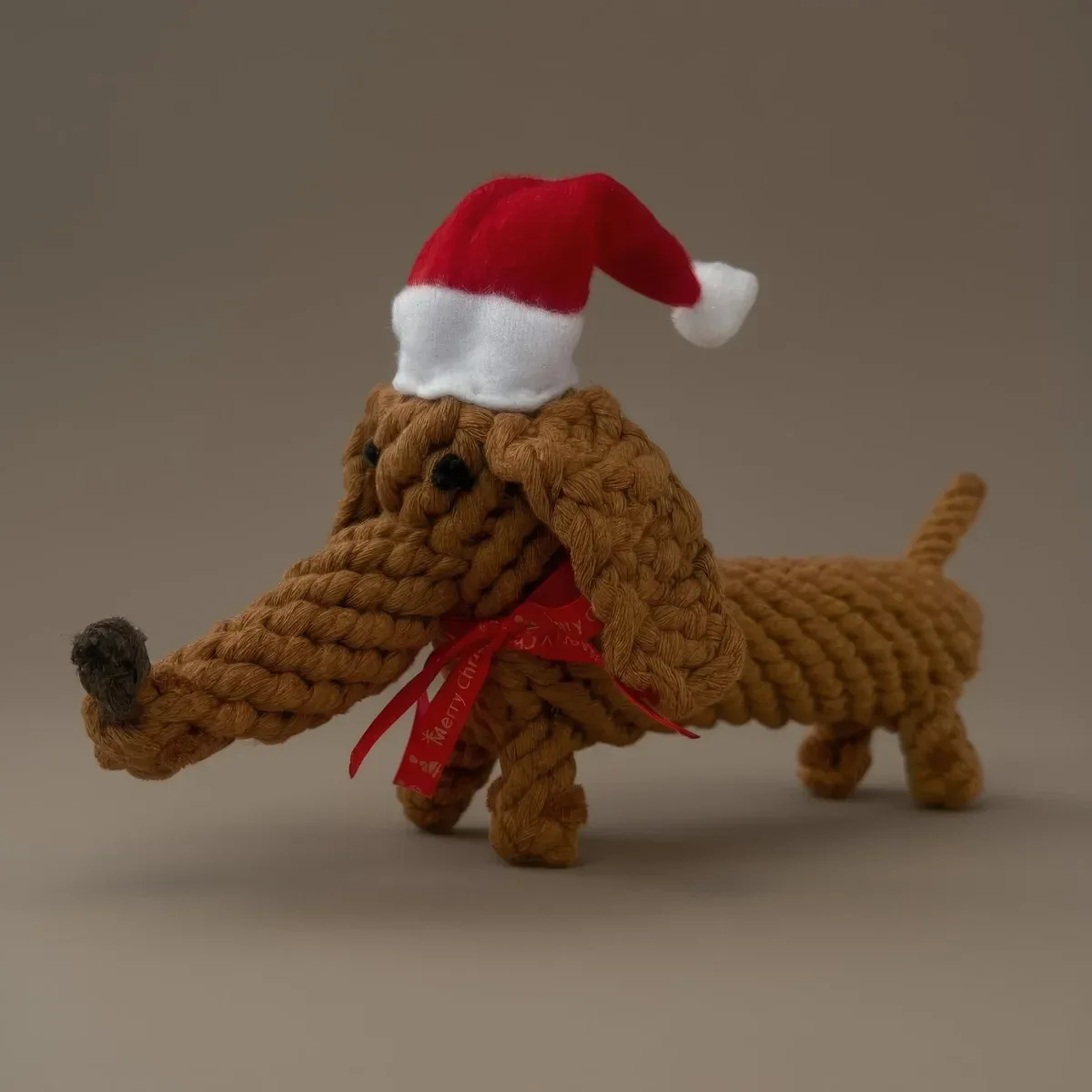 Santa Sausage mäyräkoiran muotoinen lelu