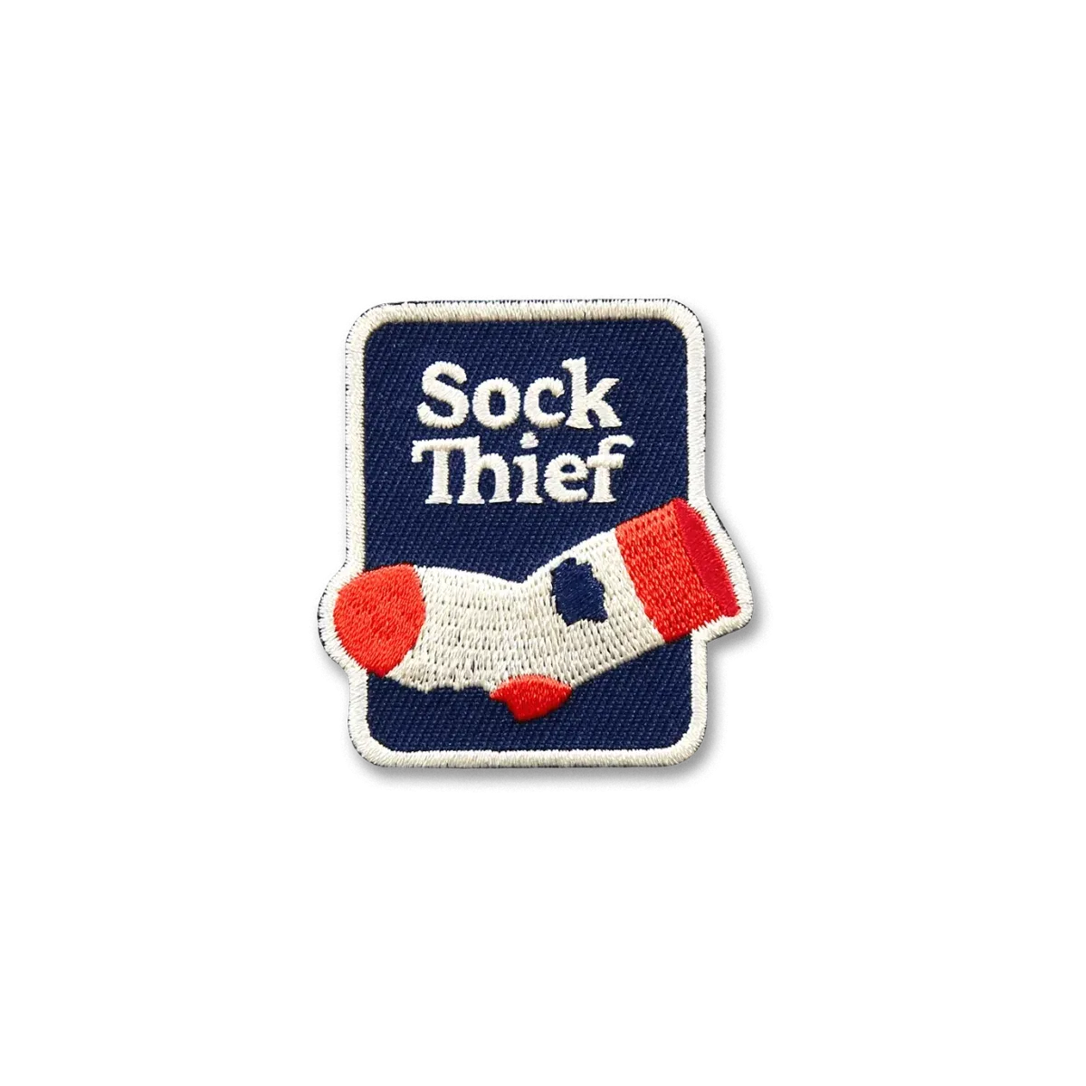 Sock Thief -silitettävä kangasmerkki koiralle