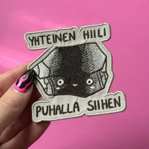 Yhteinen hiili, puhalla siihen – Kangasmerkki